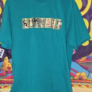 Supreme Teal Tee with Egyptian Style Lettering